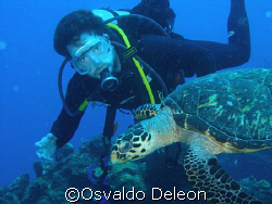 My friend Jaime and the turtle at Statia.  Saludos Jaime by Osvaldo Deleon 